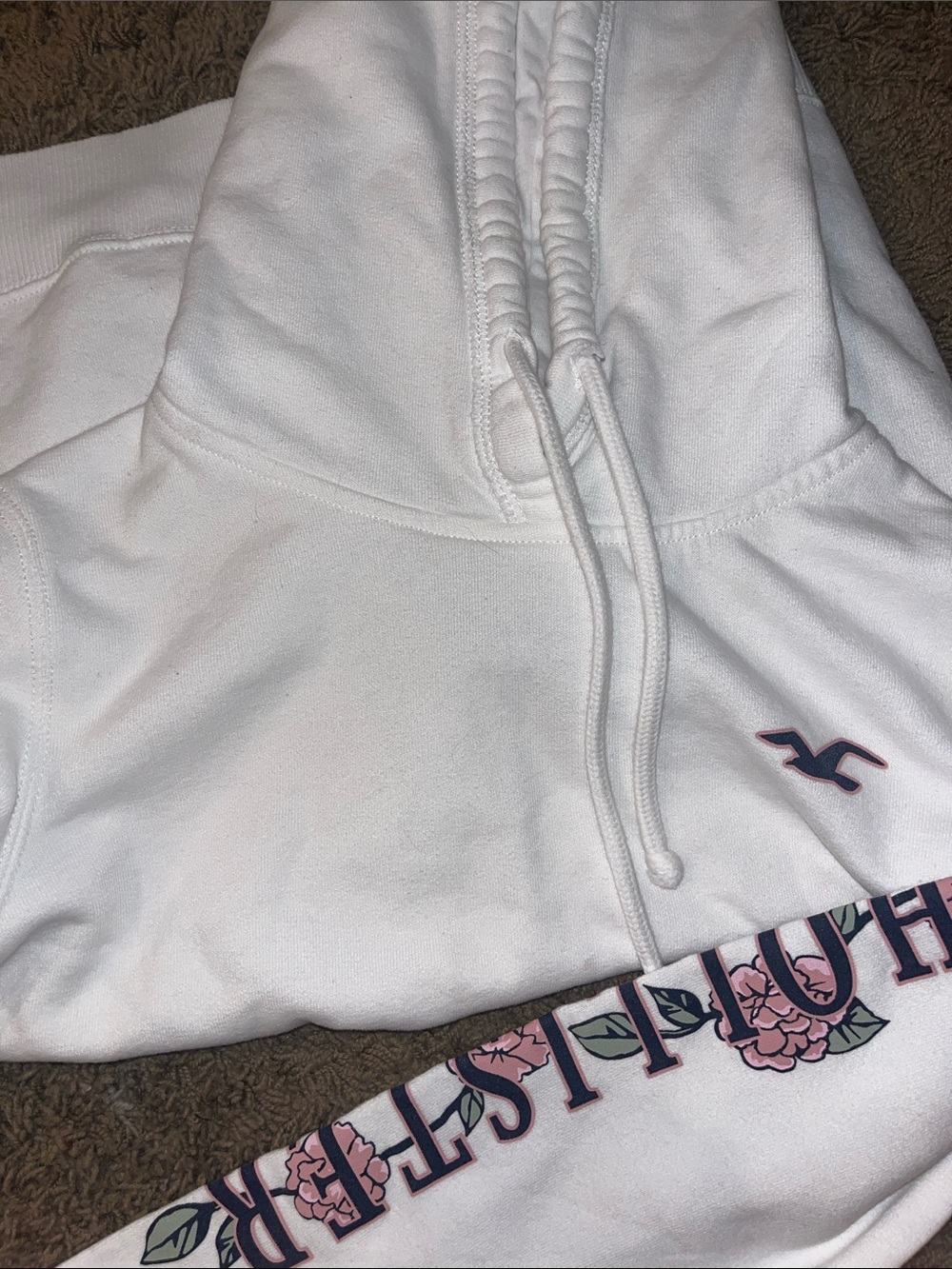 Hollister White Hooded Sweatpants with Pink Floral Logo